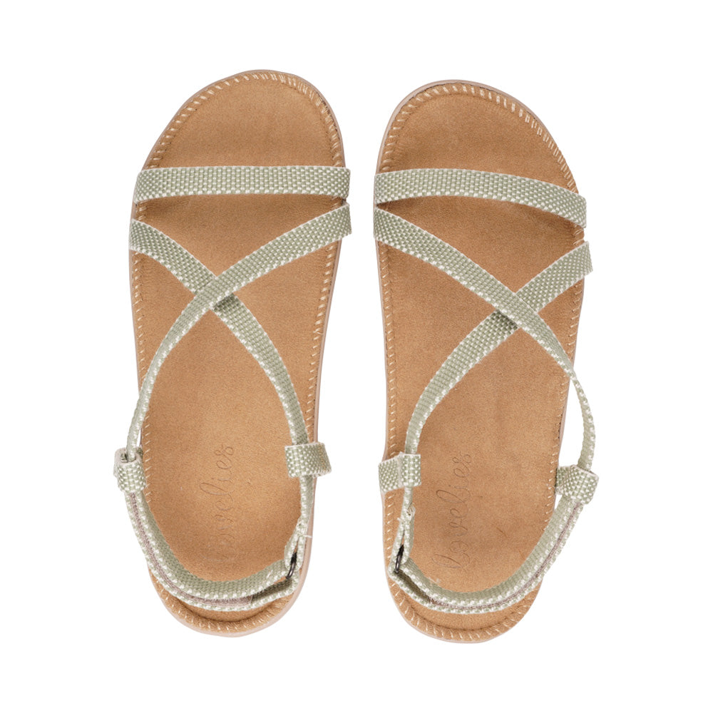 Discover Aguas Blanca, the ultimate blend of comfort and sophisticated style. Designed for effortless wear, Aguas Blanca features a luxurious suede insole that offers exceptional softness with every step. The double-layer rubber soledelivers the perfect bounce, combining durability with lightweight comfort.
Thoughtfully crafted, the sandal's elegant straps wrap securely around the heel, offering a flawless fit and enhanced stability. An adjustable heel strap ensures personalized comfort, adapting perf