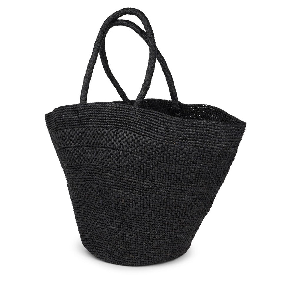 Anakao, the charming bag fashioned from luxurious raffia sourced from Madagascar.  Tailored for your everyday adventures, this tote boasts a spacious main compartment to accommodate all your necessities while you're on the move.  Raffia, derived from the resilient leaves of the palm tree, is celebrated for its versatility and eco-conscious qualities, making it a sought-after material in the realm of fashion accessories.