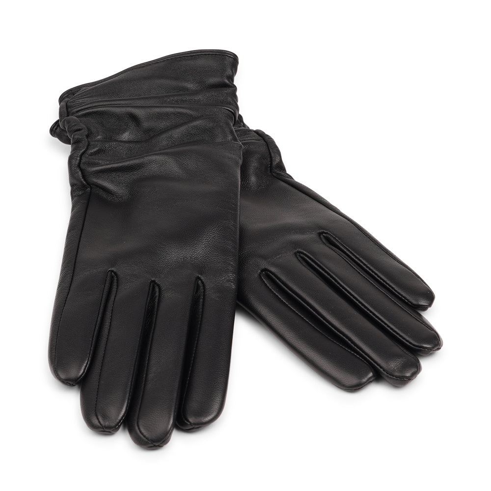 The Asti gloves are crafted from supple leather and lined with luxurious cashmere, offering both elegance and warmth.
Designed with a feminine touch, these gloves provide a sleek and sophisticated look while ensuring superior comfort during colder days. Perfect for adding a touch of refinement to any winter outfit.