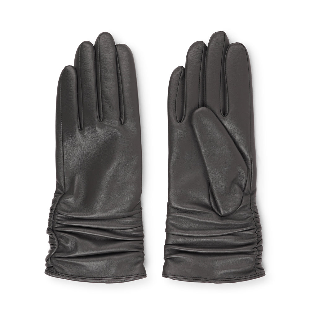 Lovelies Studio - Denmark - The Asti gloves are crafted from supple leather and lined with luxurious cashmere, offering both elegance and warmth.
Designed with a feminine touch, these gloves provide a sleek and sophisticated look while ensuring superior comfort during colder days. Perfect for adding a touch of refinement to any winter outfit.