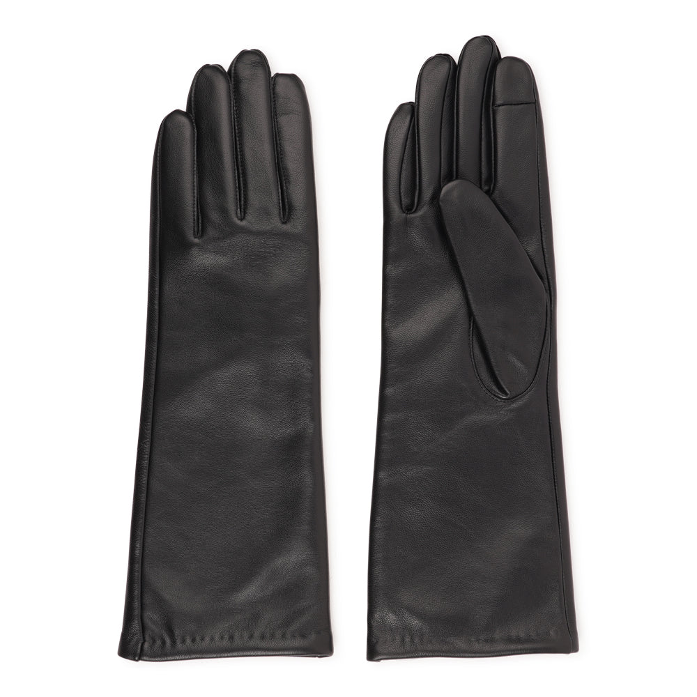 Lovelies studio - Denmark - The Bargia gloves are crafted from soft, supple leather and lined with luxurious cashmere for exceptional warmth and comfort. Designed with a feminine silhouette, they combine elegance and practicality in one timeless piece. Perfect for elevating your winter wardrobe, these gloves bring a refined finishing touch to any cold-weather outfit.