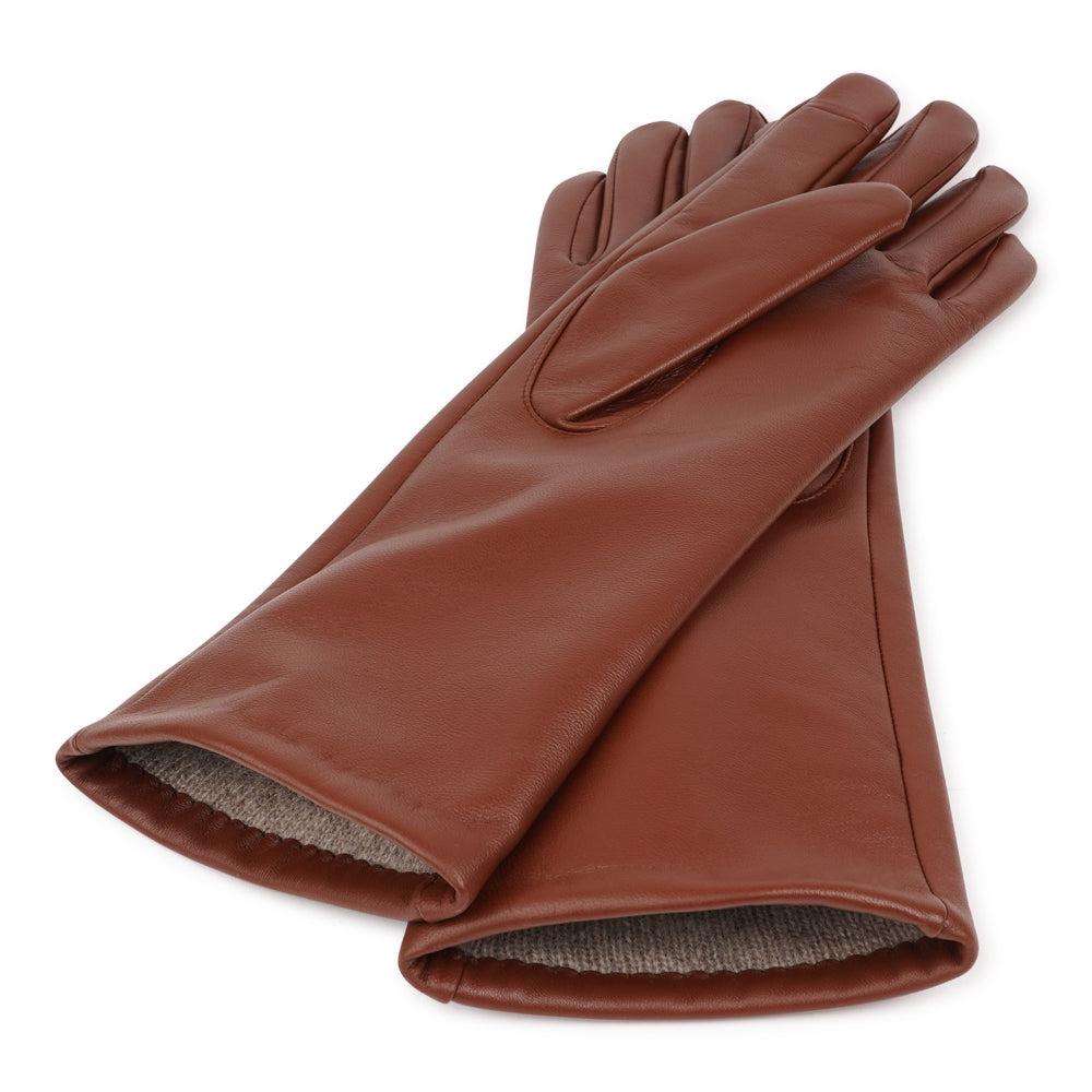 Lovelies Studio - The Bargia gloves are crafted from soft, supple leather and lined with luxurious cashmere for exceptional warmth and comfort. Designed with a feminine silhouette, they combine elegance and practicality in one timeless piece. Perfect for elevating your winter wardrobe, these gloves bring a refined finishing touch to any cold-weather outfit.
