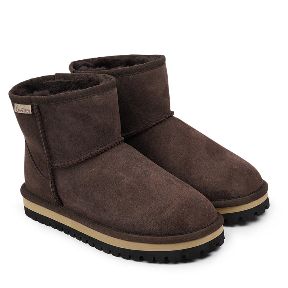 Lovelies Studio - Danish design - Mid-high Shearling boots  Lovelies shearling boots bring softness and warmth to your feet this autumn. With soft and durable rubber soles plus a gorgeous design you're perfectly suited for the wintertime. 