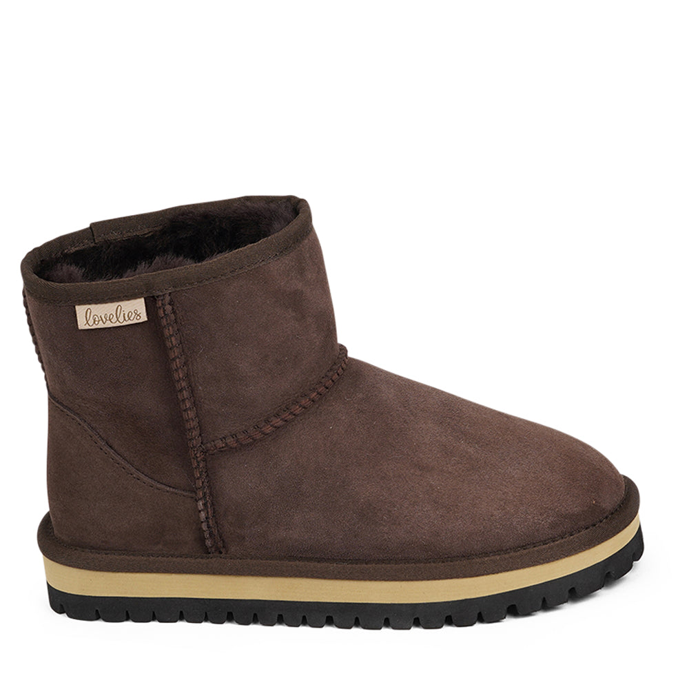 Lovelies Studio - Danish design - Mid-high Shearling boots  Lovelies shearling boots bring softness and warmth to your feet this autumn. With soft and durable rubber soles plus a gorgeous design you're perfectly suited for the wintertime. 