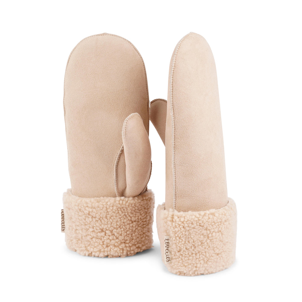 The cozy Belukta mittens are made of 100% Australian double faced shearling.  The palm and upper are soft sheep skin and the beautiful cuff and the lining are made of curly sheep fur. The thumb is made with only one side sawing for the best comfort and style.  Our Belukta mittens are extra long which means that you can fold and wear them in 4 different ways.