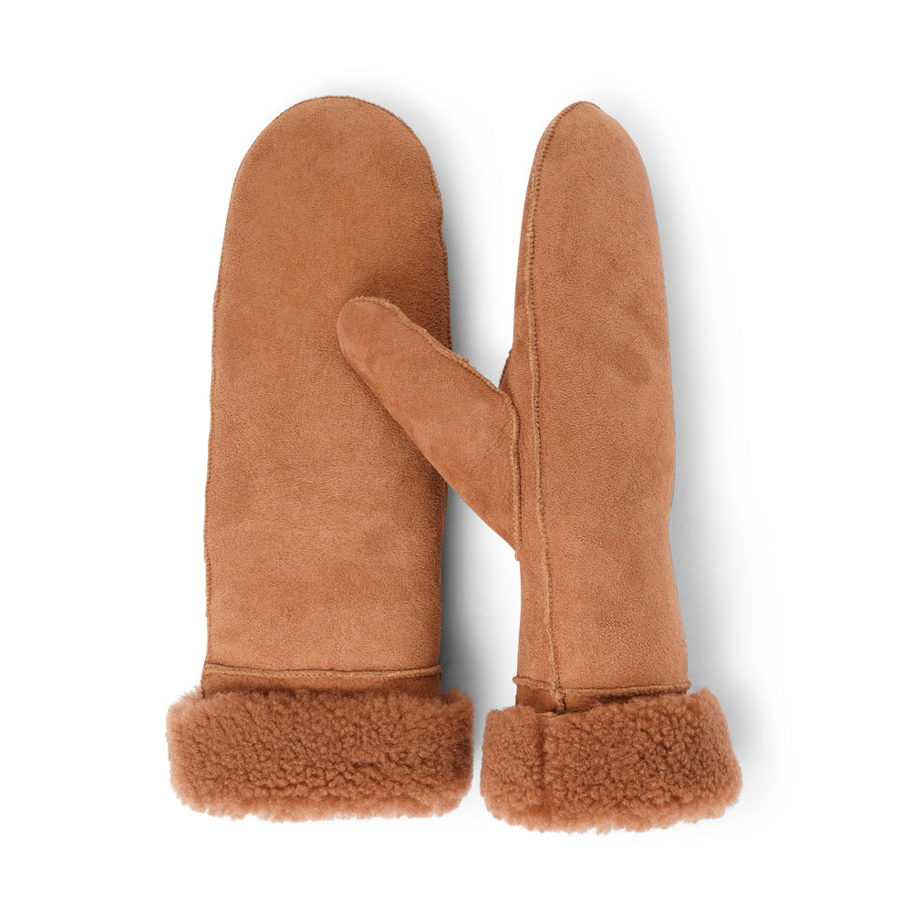 The cozy Belukta mittens are made of 100% Australian double faced shearling.  The palm and upper are soft sheep skin and the beautiful cuff and the lining are made of curly sheep fur. The thumb is made with only one side sawing for the best comfort and style.  Our Belukta mittens are extra long which means that you can fold and wear them in 4 different ways.