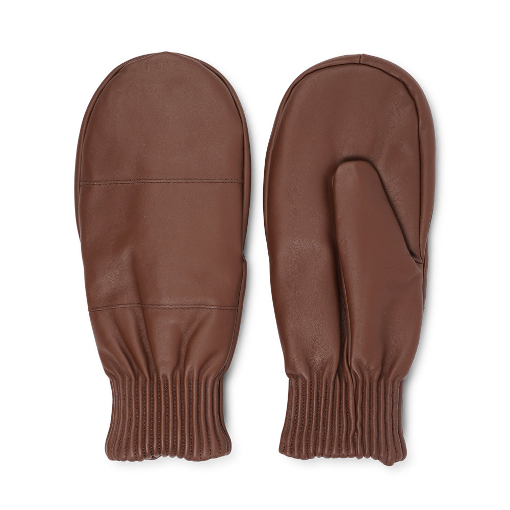 The Bergamo mittens are crafted from soft, premium leather and lined with cozy terry fleece for ultimate warmth and comfort.
Designed for a sleek, timeless look, they feature an elastic wrist for a secure fit. Perfect for cold days, these luxurious mittens combine style and practicality with ease.