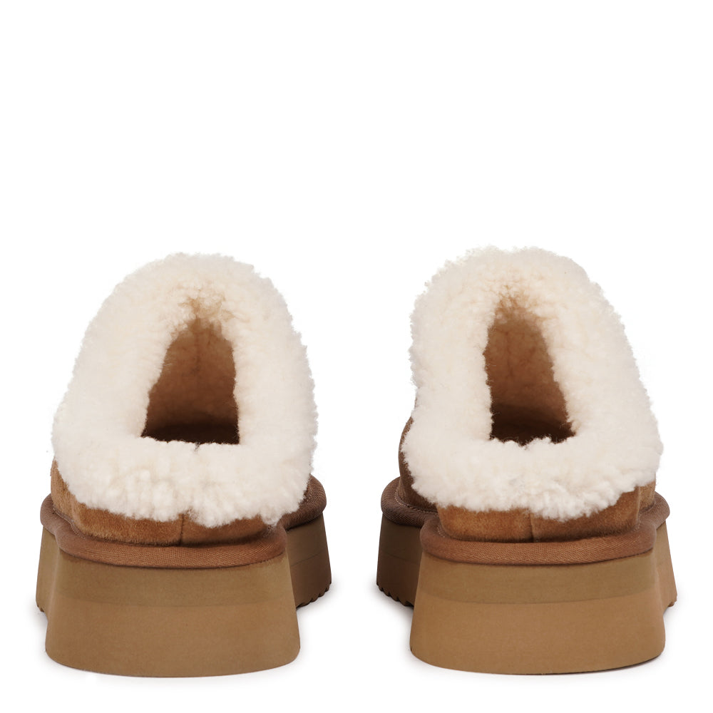 Lovelies Studio - High Mules with Curly Shearling Details
Step into warmth and effortless style with Lovelies’ shearling mules — beautifully crafted to offer ultimate comfort and a timeless look. Made from soft, curly natural shearling and finished with durable, flexible soles, these mules keep your feet cosy and supported all year round.
When you first slip them on, they may feel slightly snug across the toes and instep. Don’t worry — the natural shearling will quickly soften and adapt to your feet
