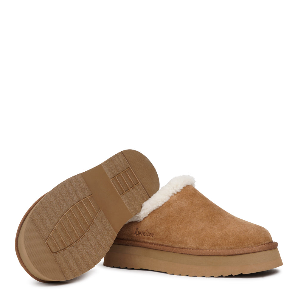 Lovelies Studio - High Mules with Curly Shearling Details
Step into warmth and effortless style with Lovelies’ shearling mules — beautifully crafted to offer ultimate comfort and a timeless look. Made from soft, curly natural shearling and finished with durable, flexible soles, these mules keep your feet cosy and supported all year round.
When you first slip them on, they may feel slightly snug across the toes and instep. Don’t worry — the natural shearling will quickly soften and adapt to your feet