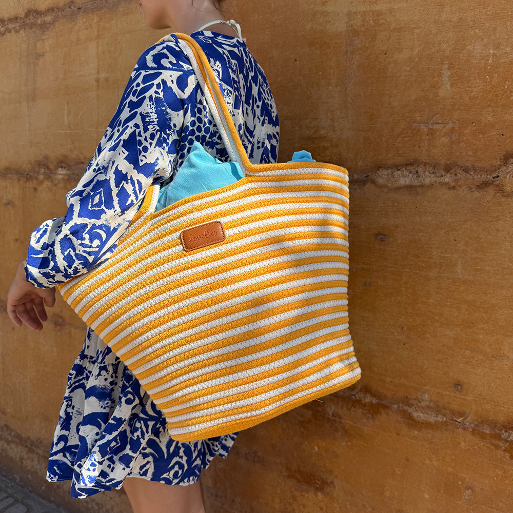 Capri Striped Cotton Tote
Turn heads this summer with the Capri Tote, a stylish and practical bag designed for sunny days. Perfect for the beach, market visits, or weekend outings, it combines a classic striped look with effortless functionality.
Available in three beautiful stripe color combinations, Capri lets you choose the perfect match for your summer style. Spacious and lightweight, it easily carries all your daily essentials while adding a fresh seasonal touch to your outfit.