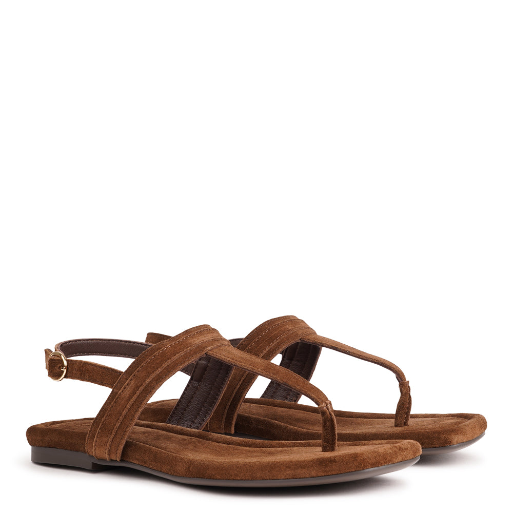 Carini, our luxurious soft suede leather sandals, designed with your comfort and style in mind.
The soft midsole, also covered in supple suede, offers an extra layer of cushioning for unparalleled comfort throughout the day.
With its delicate and soft suede, these sandals effortlessly combine ease and elegance. Whether you're dressing up in a feminine dress or going for a casual summer jeans look, these easy-to-go sandals will complement your outfit flawlessly.