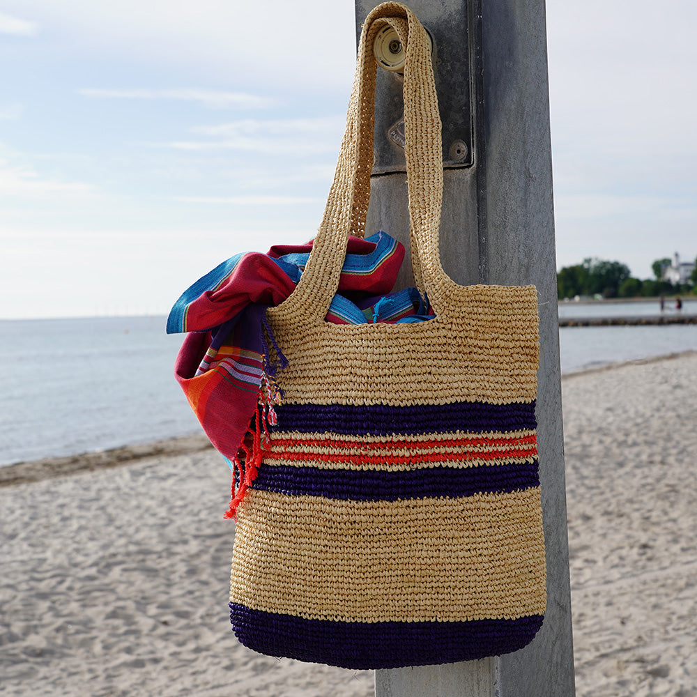 Lovelies Studio - Cavallo braided raffia tote bag - Handcrafted with precision, raffia handbags epitomize a blend of casual sophistication, suitable for a myriad of occasions, be it a leisurely outing or a formal affair. The subtle texture and natural hues of raffia lend an understated elegance to any attire, appealing to discerning fashion enthusiasts.