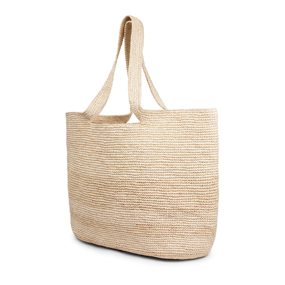 Cavallo, the charming Casual Shoulder tote bag fashioned from luxurious raffia sourced from Madagascar.  Tailored for your everyday adventures, this tote boasts a spacious main compartment to accommodate all your necessities while you're on the move.  Raffia, derived from the resilient leaves of the palm tree, is celebrated for its versatility and eco-conscious qualities, making it a sought-after material in the realm of fashion accessories.