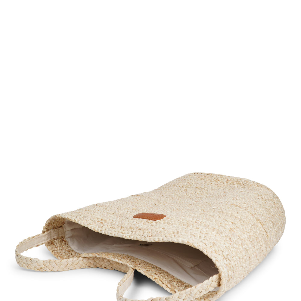 Lovelies Studio - Denmark - Handmade with care, the Cerbus Maize Bag is your perfect companion for a trip to the market or a sunny day at the beach. Made of beautifully braided maize, it features a soft cotton lining and a small inner pocket—perfect for keeping your phone or essentials close at hand. Spacious, lightweight, and full of natural charm – it’s where function meets effortless style.