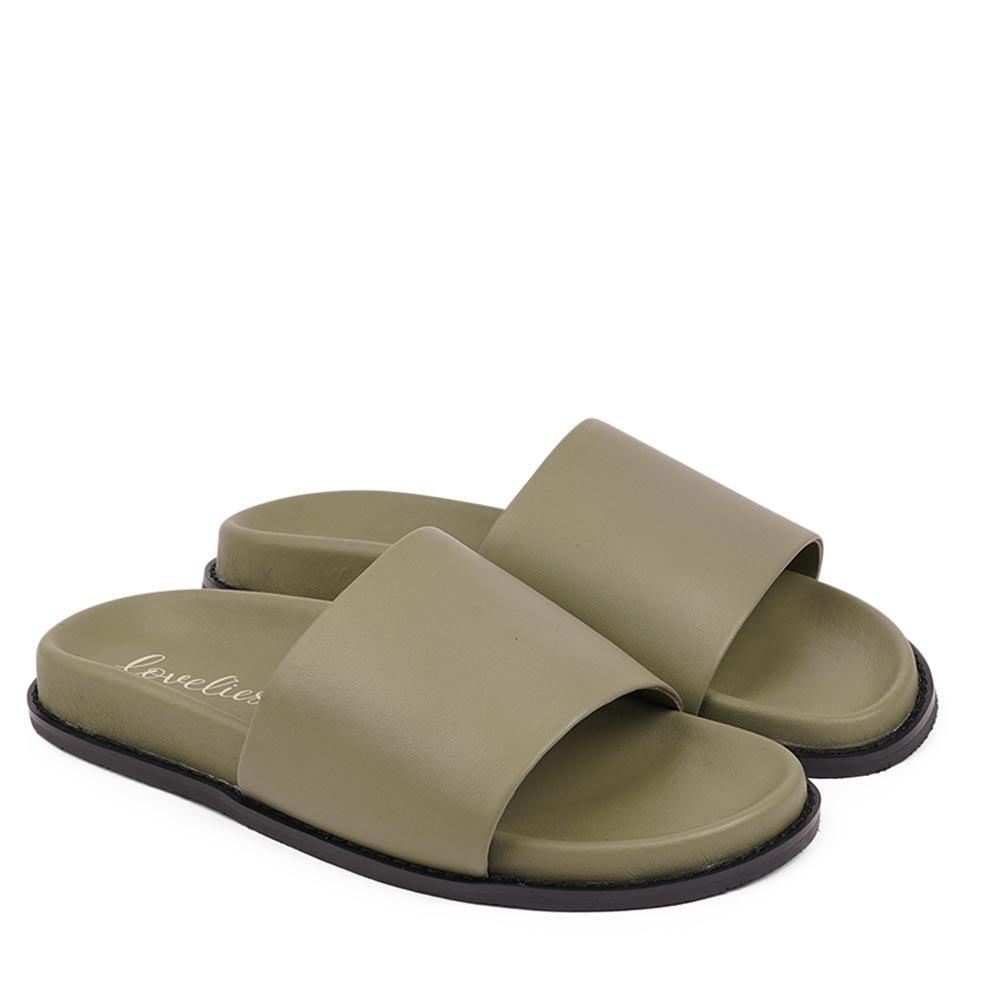 Lovelies Studio - Exclusive Nappa Leather Slide Sandals
Step into effortless elegance with our exclusive slide sandals, crafted with a soft rubber sole wrapped in luxurious nappa leather. Designed for all-day comfort, the adjustable velcro leather straps ensure a secure and personalized fit.
The supple nappa leather and sleek silhouette create a refined yet relaxed look-perfect with a flowing summer dress or your favorite jeans.