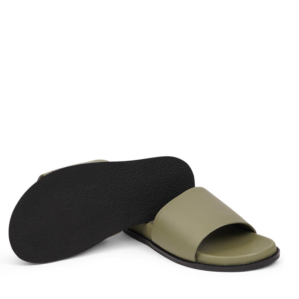 Lovelies Studio - Exclusive Nappa Leather Slide Sandals
Step into effortless elegance with our exclusive slide sandals, crafted with a soft rubber sole wrapped in luxurious nappa leather. Designed for all-day comfort, the adjustable velcro leather straps ensure a secure and personalized fit.
The supple nappa leather and sleek silhouette create a refined yet relaxed look-perfect with a flowing summer dress or your favorite jeans.
