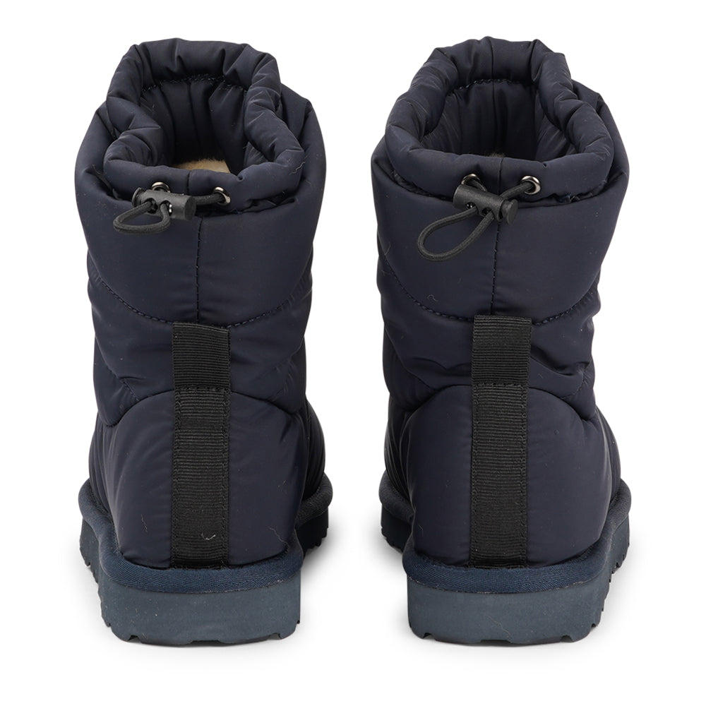 Designed to keep your feet cozy and stylish all autumn long. Experience ultimate softness and warmth as the luxurious shearling lining wraps your feet in comfort.
With their soft and durable rubber soles, these boots provide a perfect combination of flexibility and durability, making them ideal for the wintertime. No need to worry about wet weather – the quilted nylon material is water-resistant, keeping your feet dry and comfortable even on rainy days.