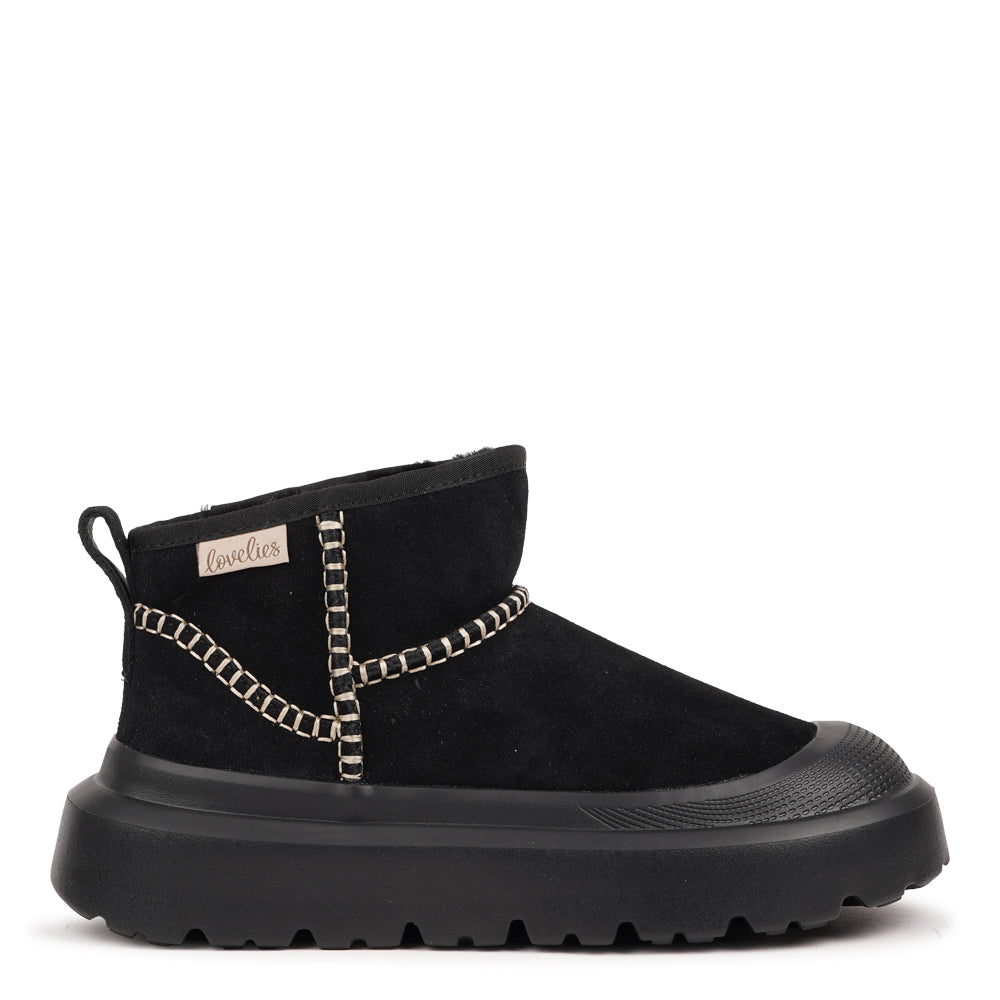 Lovelies - Embrace warmth and softness this autumn with Lovelies’ shearling boots - where comfort meets timeless design. Crafted with plush natural shearling and detailed stitching, these boots offer both style and durability for the colder months.
The lightweight EVA rubber sole provides excellent flexibility and grip, ensuring comfort with every step — perfect for keeping your feet cosy and supported all winter long.