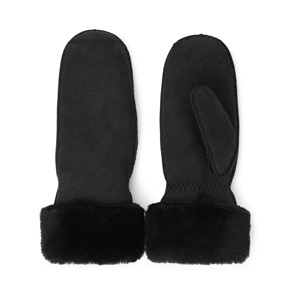 Lovelies Studio - The Cima Long Shearling Mittens are crafted from 100% Australian double-faced shearling for ultimate warmth. The soft sheepskin palm and upper are complemented by a luxurious cuff and lining made of straight sheep fur.
Designed with an elastic wrist closure, these mittens offer a snug, comfortable fit. You can fold down the shearling cuff and tuck it under your coat sleeves for extra warmth, or wear the mittens over your winter sweater sleeves for added style and coziness.