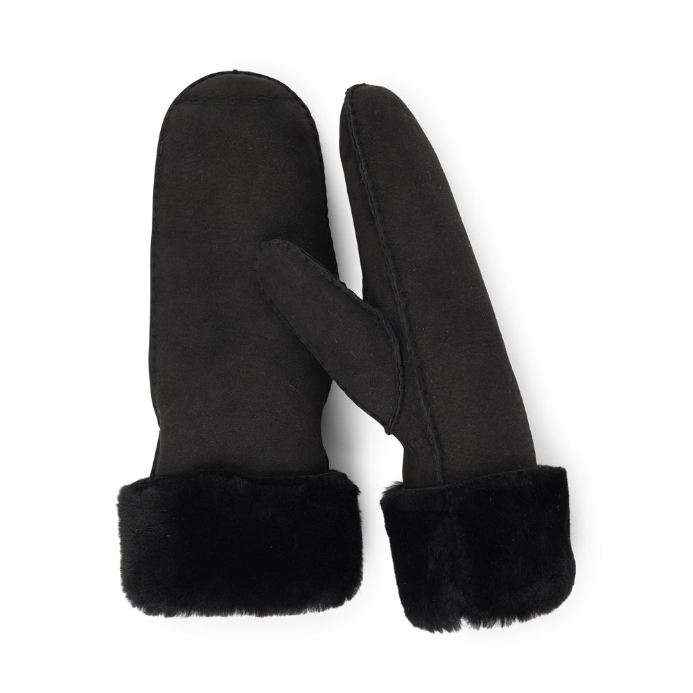 Lovelies Studio - The Cima Long Shearling Mittens are crafted from 100% Australian double-faced shearling for ultimate warmth. The soft sheepskin palm and upper are complemented by a luxurious cuff and lining made of straight sheep fur.
Designed with an elastic wrist closure, these mittens offer a snug, comfortable fit. You can fold down the shearling cuff and tuck it under your coat sleeves for extra warmth, or wear the mittens over your winter sweater sleeves for added style and coziness.