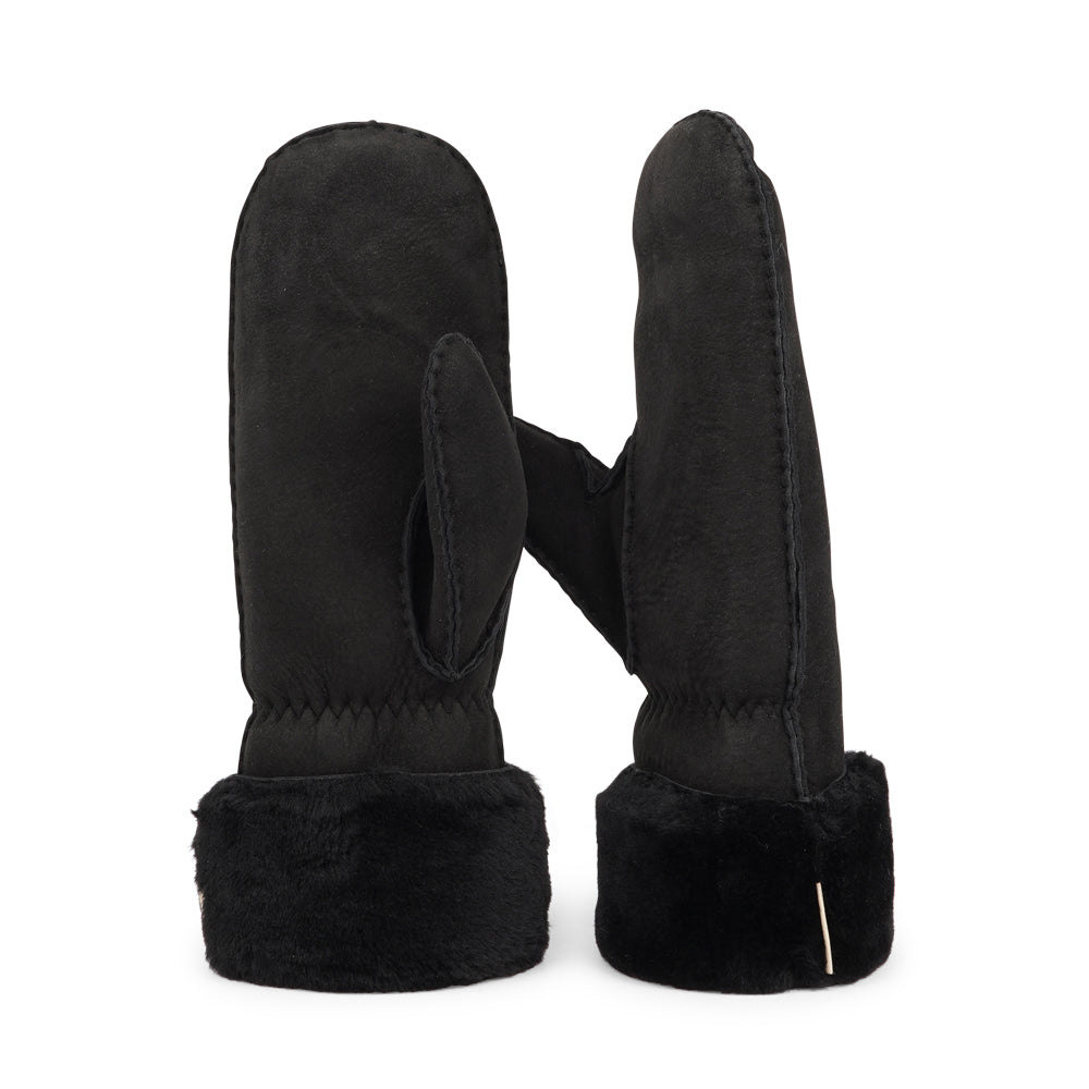 Lovelies Studio - The Cima Long Shearling Mittens are crafted from 100% Australian double-faced shearling for ultimate warmth. The soft sheepskin palm and upper are complemented by a luxurious cuff and lining made of straight sheep fur.
Designed with an elastic wrist closure, these mittens offer a snug, comfortable fit. You can fold down the shearling cuff and tuck it under your coat sleeves for extra warmth, or wear the mittens over your winter sweater sleeves for added style and coziness.