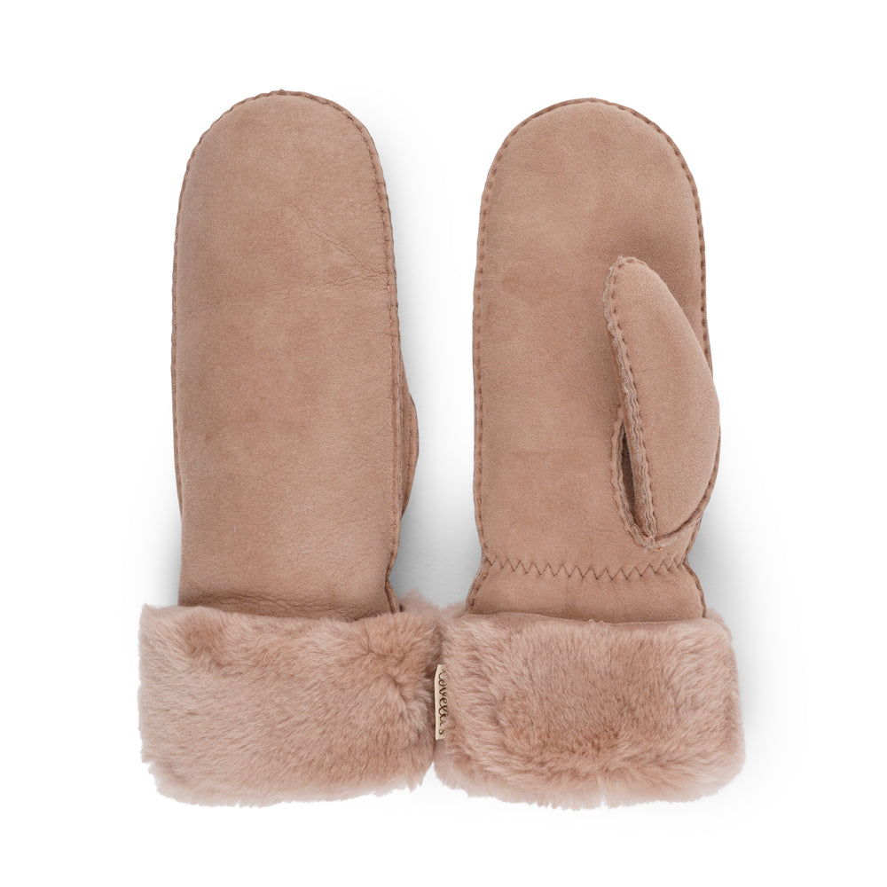 The Cima Long Shearling Mittens are crafted from 100% Australian double-faced shearling for ultimate warmth. The soft sheepskin palm and upper are complemented by a luxurious cuff and lining made of straight sheep fur.
Designed with an elastic wrist closure, these mittens offer a snug, comfortable fit. You can fold down the shearling cuff and tuck it under your coat sleeves for extra warmth, or wear the mittens over your winter sweater sleeves for added style and coziness.