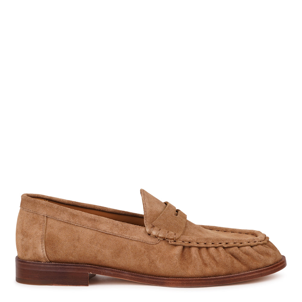 Corleone is a handcrafted Italian suede loafer that combines timeless elegance with contemporary cool.
Each pair is meticulously made using premium cow suede, delivering a soft, luxurious feel underfoot. The loafer features a full leather construction—from the supple suede upper to the leather lining, footbed, and durable leather outsole. Every detail reflects quality craftsmanship designed to age beautifully.
LWG Environmental GOLD RATED certified, ensuring responsible leather sourcing and production. A