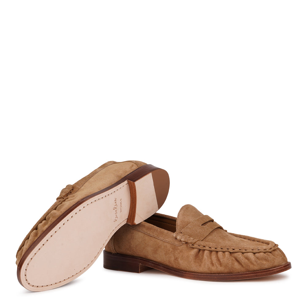 Corleone is a handcrafted Italian suede loafer that combines timeless elegance with contemporary cool.
Each pair is meticulously made using premium cow suede, delivering a soft, luxurious feel underfoot. The loafer features a full leather construction—from the supple suede upper to the leather lining, footbed, and durable leather outsole. Every detail reflects quality craftsmanship designed to age beautifully.
LWG Environmental GOLD RATED certified, ensuring responsible leather sourcing and production. A