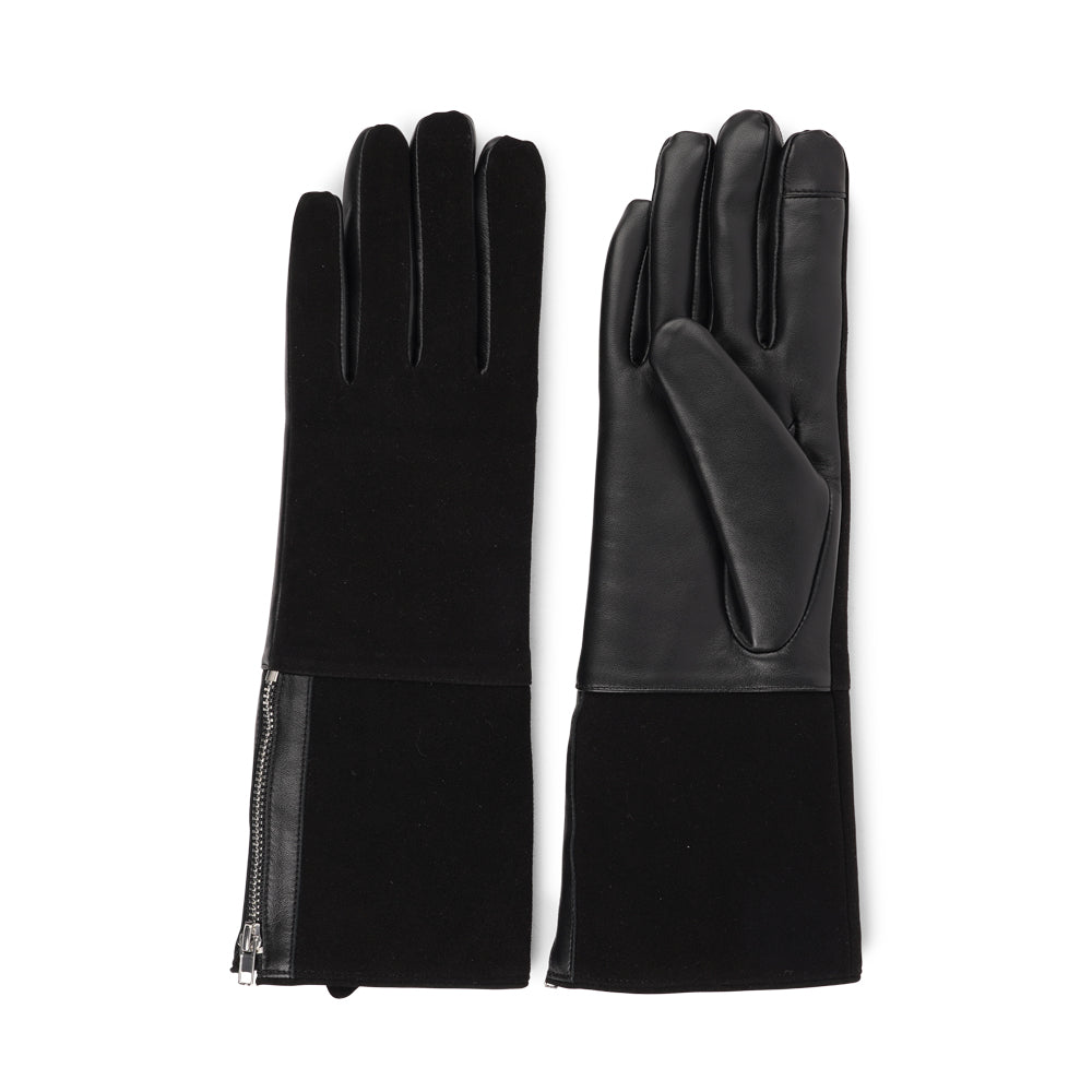 Lovelies Studio - The Cremona gloves combine elegance and warmth, crafted from soft leather with a chic zip detail for a modern touch. Lined with luxurious shearling, these gloves offer superior comfort and insulation.
Their feminine design and refined style make Cremona the perfect accessory for staying stylish in colder weather.