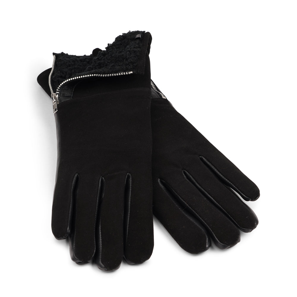 Lovelies Studio - The Cremona gloves combine elegance and warmth, crafted from soft leather with a chic zip detail for a modern touch. Lined with luxurious shearling, these gloves offer superior comfort and insulation.
Their feminine design and refined style make Cremona the perfect accessory for staying stylish in colder weather.