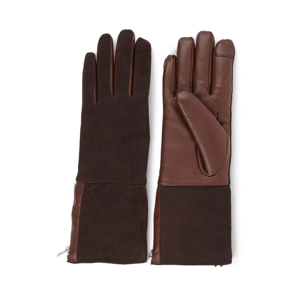 Lovelies Studio - The Cremona gloves combine elegance and warmth, crafted from soft leather with a chic zip detail for a modern touch. Lined with luxurious shearling, these gloves offer superior comfort and insulation.
Their feminine design and refined style make Cremona the perfect accessory for staying stylish in colder weather.