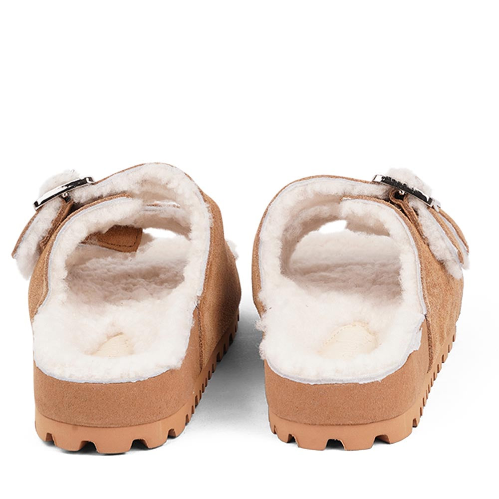 Lovelies Studio - Adjustable suede sandals with shearling lining Lovelies shearling sandals will bring softness and warmth to your feet this autumn. The combination of soft shearling and the durable cork and rubber sole guarantees the utmost comfort to the wearer.