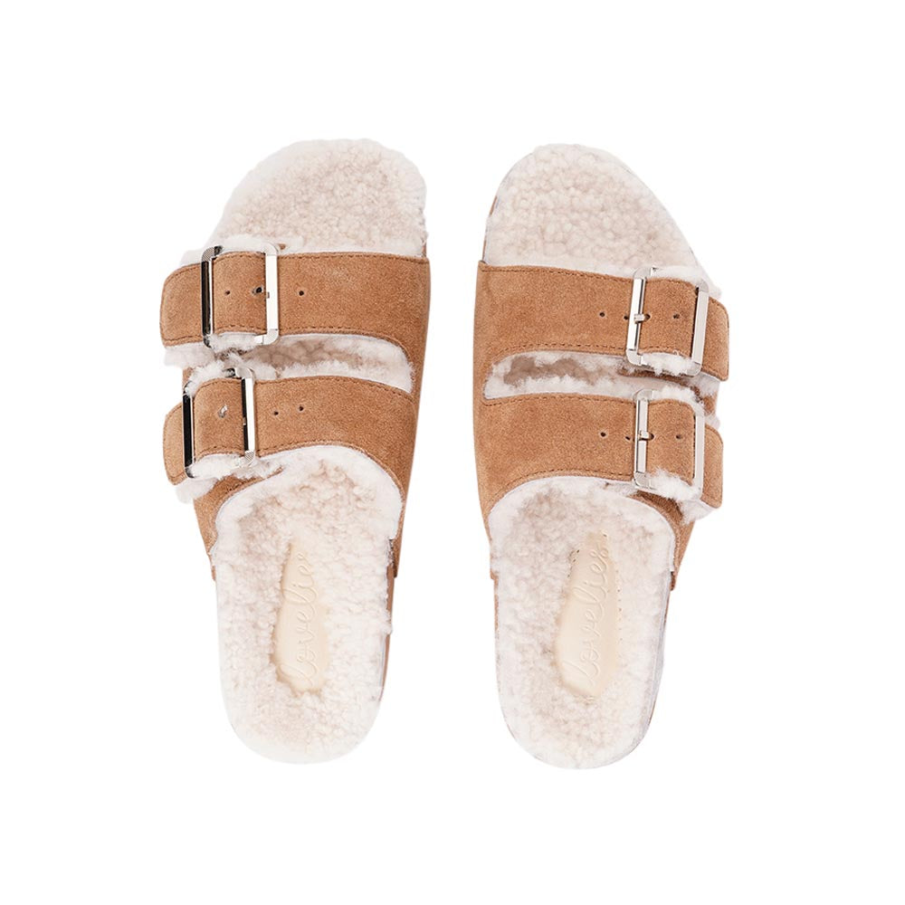 Lovelies Studio - Adjustable suede sandals with shearling lining Lovelies shearling sandals will bring softness and warmth to your feet this autumn. The combination of soft shearling and the durable cork and rubber sole guarantees the utmost comfort to the wearer.