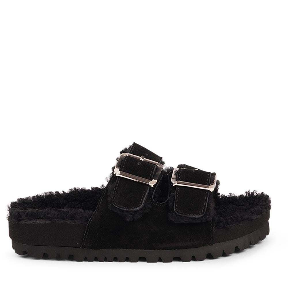 Lovelies Studio - Adjustable suede sandals with shearling lining Lovelies shearling sandals will bring softness and warmth to your feet this autumn. The combination of soft shearling and the durable cork and rubber sole guarantees the utmost comfort to the wearer.