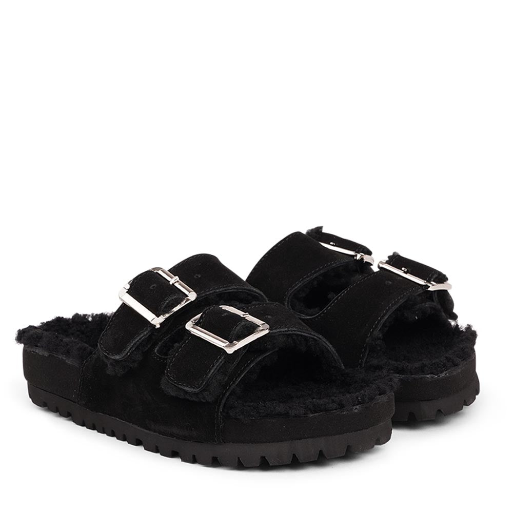 Lovelies Studio - Adjustable suede sandals with shearling lining Lovelies shearling sandals will bring softness and warmth to your feet this autumn. The combination of soft shearling and the durable cork and rubber sole guarantees the utmost comfort to the wearer.