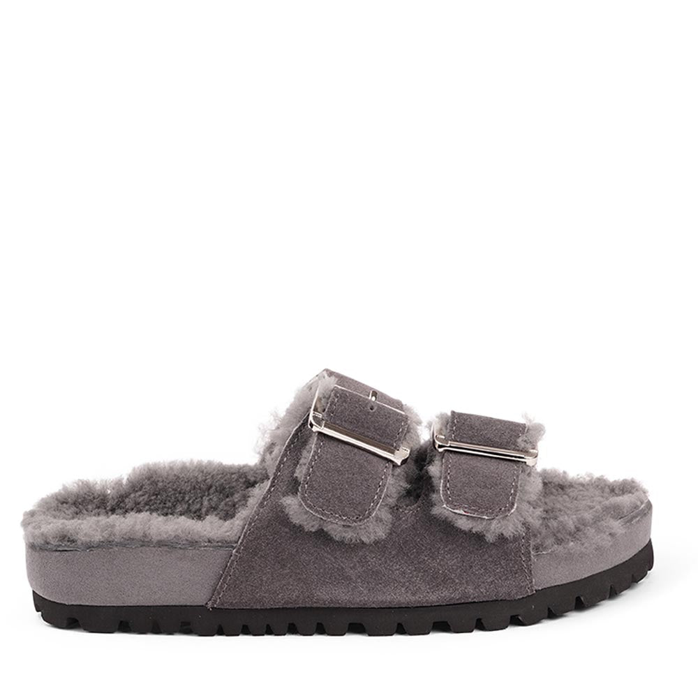 Lovelies Studio - Adjustable suede sandals with shearling lining Lovelies shearling sandals will bring softness and warmth to your feet this autumn. The combination of soft shearling and the durable cork and rubber sole guarantees the utmost comfort to the wearer.