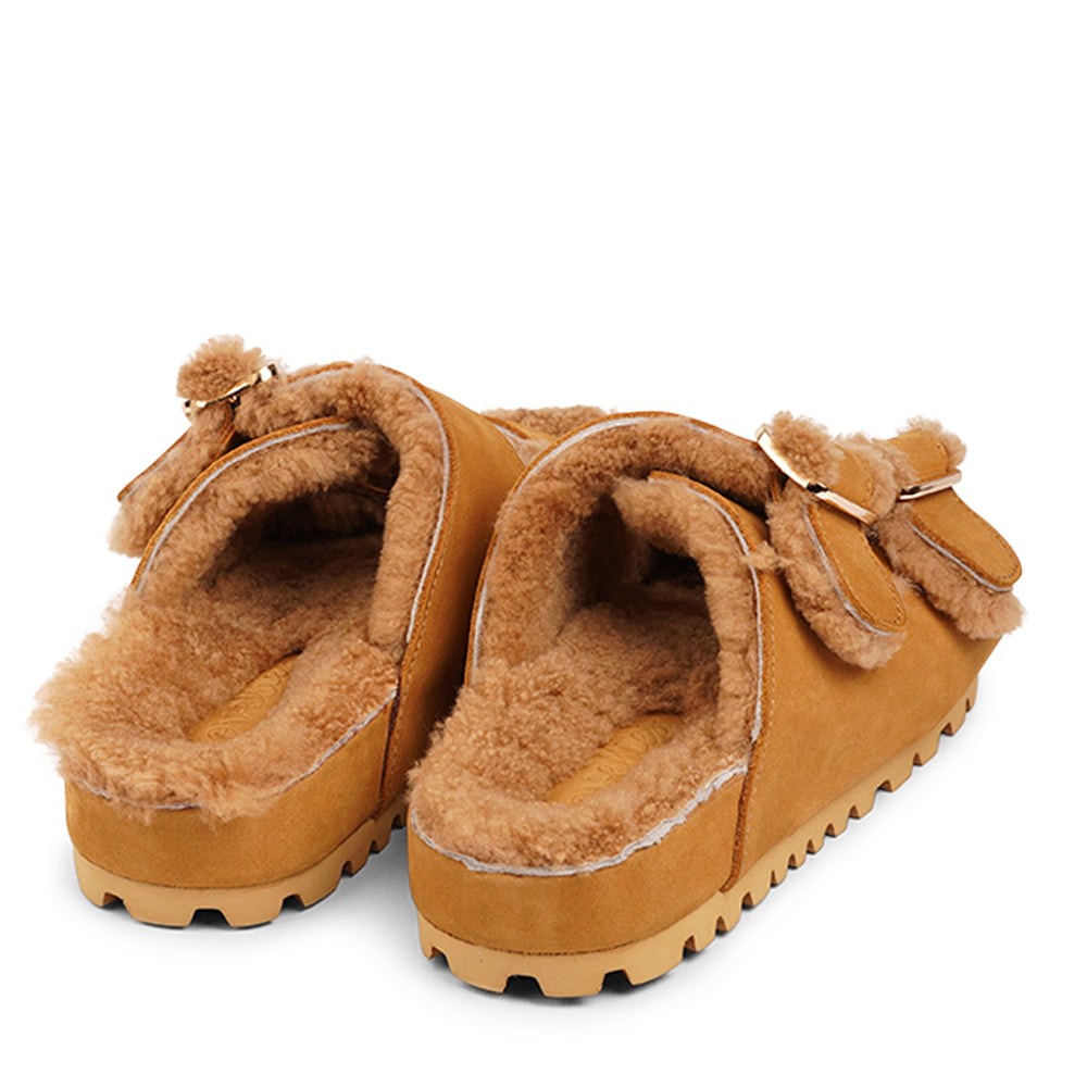 Adjustable nubuck sandals with shearling lining Lovelies shearling sandals will bring softness and warmth to your feet. They are perfect for early spring or autumn or even for a chilly summer night. The combination of soft shearling and the durable cork and rubber sole guarantees the utmost comfort to the wearer.