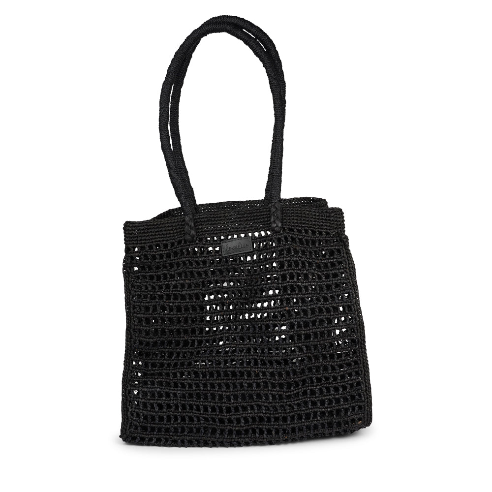 The delightful Casual Shoulder basket, expertly crafted from luxurious raffia in Madagascar.  Perfect for your daily escapades, this bag offers ample space in its main compartment to hold all your essentials while you're out and about.  Raffia is a versatile and sustainable material that has become increasingly popular in the world of handbags. Derived from the leaves of the raffia palm tree, this natural fiber offers a unique blend of durability, flexibility, and eco-friendliness.
