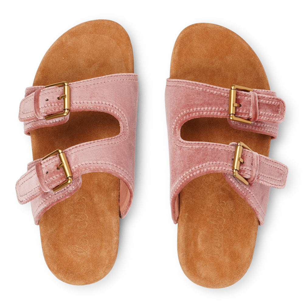 Lovelies Studio - Donori - Velvet double-strap sandals — a perfect blend of laid-back ease and refined luxury. Crafted from plush velvet with a smooth skin lining, they feature two wide straps with adjustable gold-tone buckles for a personalized fit. The contoured footbed, wrapped in premium suede, offers gentle support, while the lightweight sole ensures effortless wear from indoors to out. Ideal for relaxed days, sunny escapes, or stylish lounging at home.Adjustable gold-tone buckles