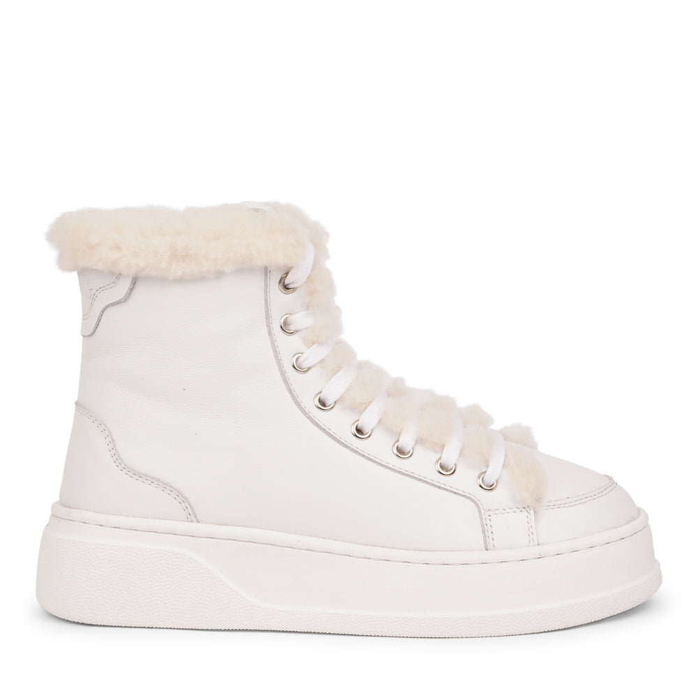 Lovelies Studio - Elevate your sneaker game with the Fajardo High Top, a true embodiment of comfort and style. Crafted to keep you not only fashion-forward but also snug and cozy.
At the foundation of the Fajardo High Top lies a soft yet durable rubber sole, ensuring long-lasting wear and exceptional grip. 
The upper is adorned with leather and features charming shearling details, adding a touch of luxury to your every step. Whether you're dressing up for a night out or aiming for a more casual look.