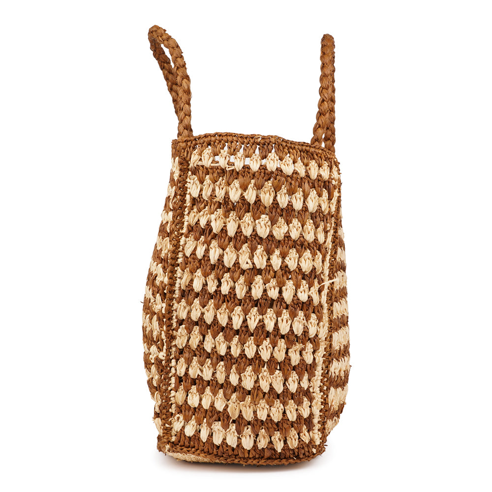 Farella Raffia Bag
Farella is a charming tote crafted from luxurious natural raffia sourced from Madagascar. Lightweight yet spacious, it features a roomy main compartment - perfect for carrying your everyday essentials.
Raffia, made from palm leaves, is known for its durability, natural texture, and eco-friendly qualities. Each bag is carefully handcrafted, combining relaxed elegance with practical design.
