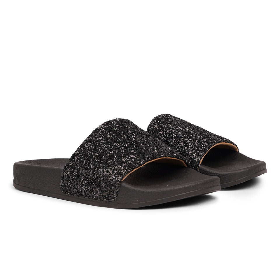 Shine all summer with Fontazzi Glitter Slides!
Perfect for any occasion, these slides feature a full glitter design that adds a touch of sparkle to your look. With a durable yet soft rubber sole, they offer all-day comfort whether you're partying or lounging by the beach.
Step into the spotlight with Fontazzi – the ultimate combination of fun, comfort, and shine!
