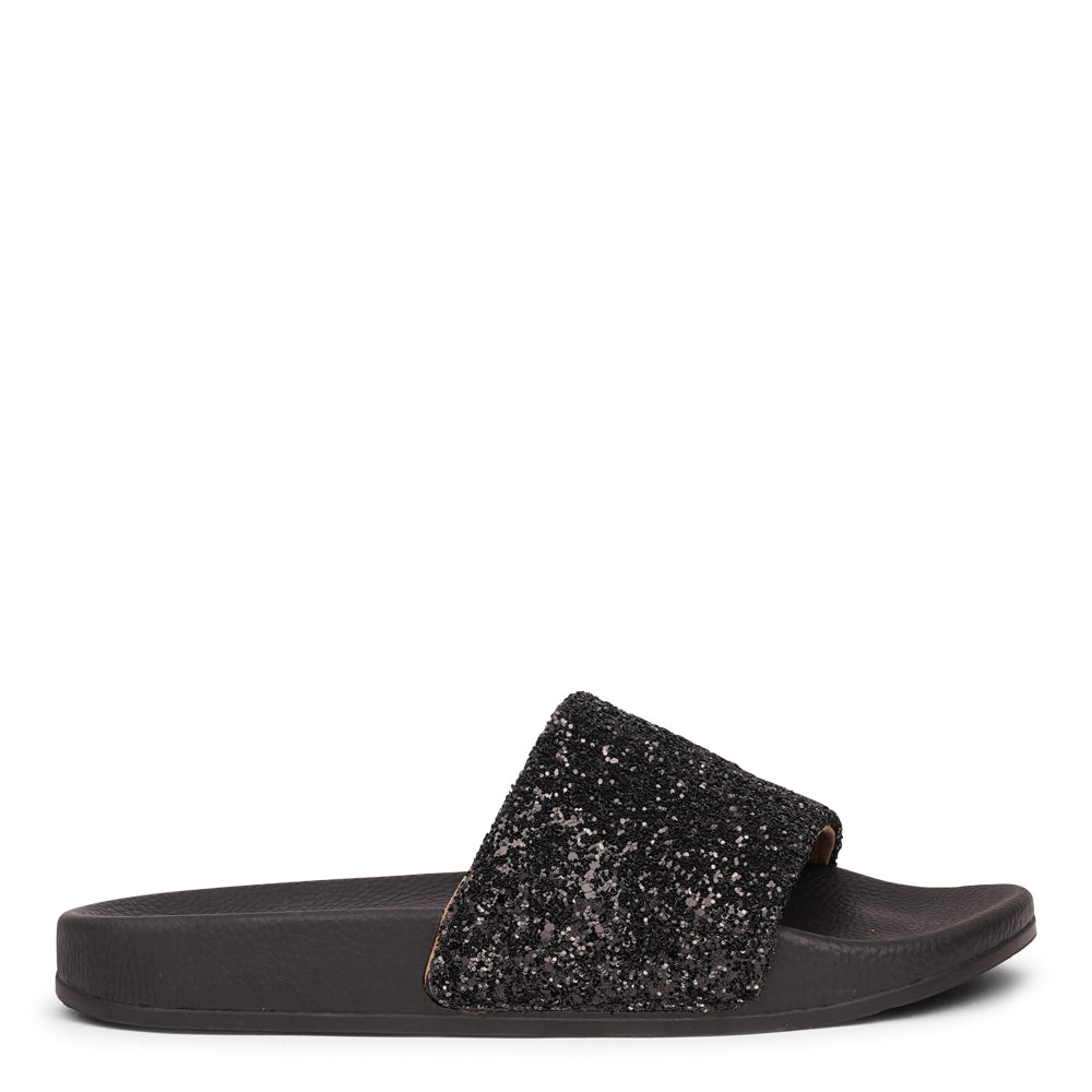 Shine all summer with Fontazzi Glitter Slides!
Perfect for any occasion, these slides feature a full glitter design that adds a touch of sparkle to your look. With a durable yet soft rubber sole, they offer all-day comfort whether you're partying or lounging by the beach.
Step into the spotlight with Fontazzi – the ultimate combination of fun, comfort, and shine!