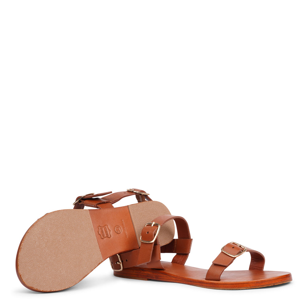 Meet Giglio, our handcrafted leather sandal designed for feminine style and everyday comfort. With three adjustable buckles for a personalized fit, Giglio combines form and function effortlessly.
Crafted from vegetable-tanned buffalo leather, the straps offer a soft yet durable feel, while the leather sole with rubber grip ensures stability with every step. Whether you're dressing up or going casual, Giglio is your perfect warm-weather companion.