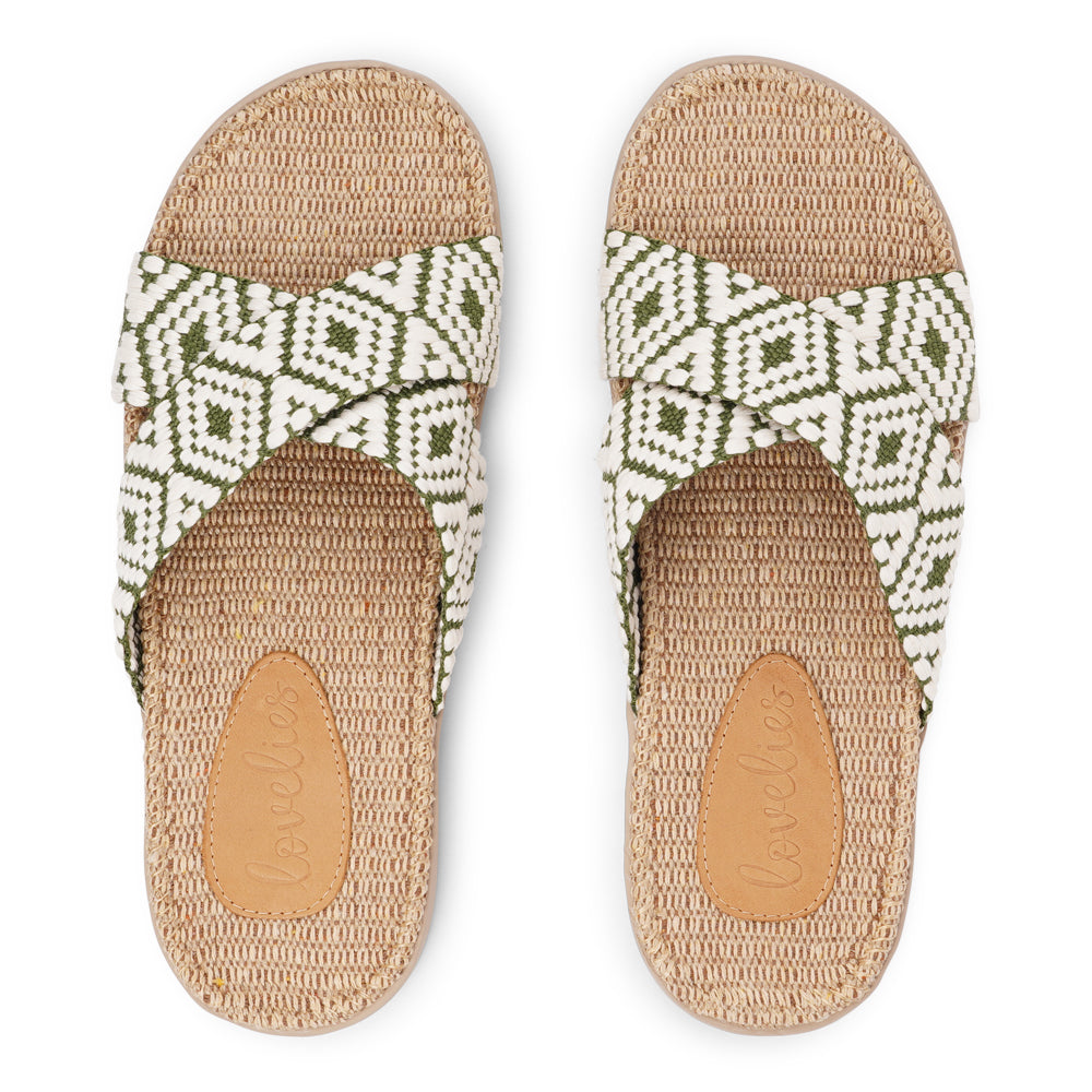 Lovelies - The Gili sandal, a tribute to the serene Indonesian island that inspired its name. A sandal imbued with the essence of natural elegance, perfect for the summer season.
Slip into the Gili sandal and treat your feet to double-layered rubber soles that cushion every step with comfort. Its mid-sole featuring natural jute adds a dash of earthy elegance.
Get ready to rock the beach with wide cotton straps boasting intricate patterns and vibrant hues, blending fashion and function seamlessly.