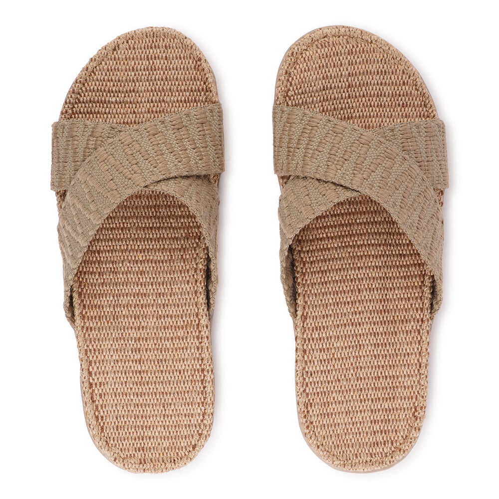 Lovelies Studio - The casual Harmal sandal, a tribute to the breathtaking beach in North Goa that inspires its name.
Step into comfort and style with its unique design, featuring double-layered soft and durable rubber soles. The mid-sole, adorned with natural jute, adds a touch of eco-friendly elegance. Embrace both fashion and comfort as you stroll, thanks to the wide cotton straps intricately woven with captivating patterns, available in a spectrum of colors.