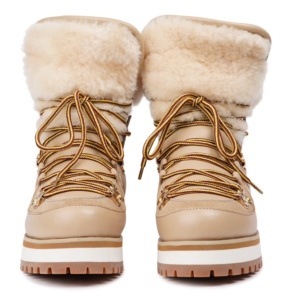 Meet the Mount Q, a trekking boot that defines luxury and performance. These boots are a testament to the finest craftsmanship, using high-end leather that's not only elegant but incredibly durable.
The addition of shearling details not only adds a touch of beauty but also keeps your feet warm and cozy during winter adventures. What's more, the robust rubber soles provide unmatched traction, making these boots perfect for icy winters. Elevate your outdoor experiences with the Mount Q, where style mee