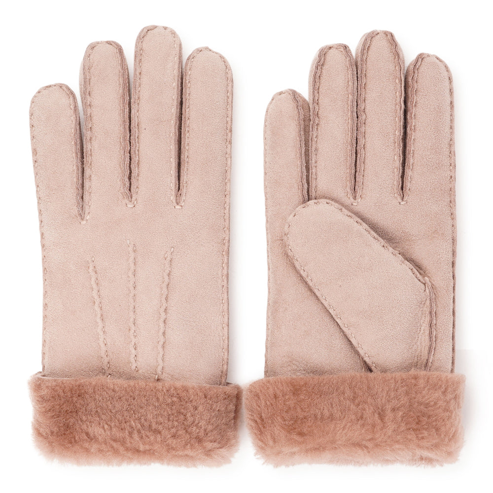 Elevate your winter wardrobe with our luxurious Kelly Shearling Gloves. Crafted from supple sheep leather, these gloves are designed to provide you with both style and warmth during the colder months.
These gloves are uniquely long and slim, providing a sleek and feminine silhouette that not only keeps you warm but also adds a chic touch to any outfit.
