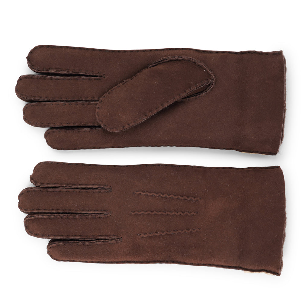 Where Elegance Meets Warmth
Elevate your winter wardrobe with our luxurious Kelly Shearling Gloves. Crafted from supple sheep leather, these gloves are designed to provide you with both style and warmth during the colder months.
These gloves are uniquely long and slim, providing a sleek and feminine silhouette that not only keeps you warm but also adds a chic touch to any outfit.