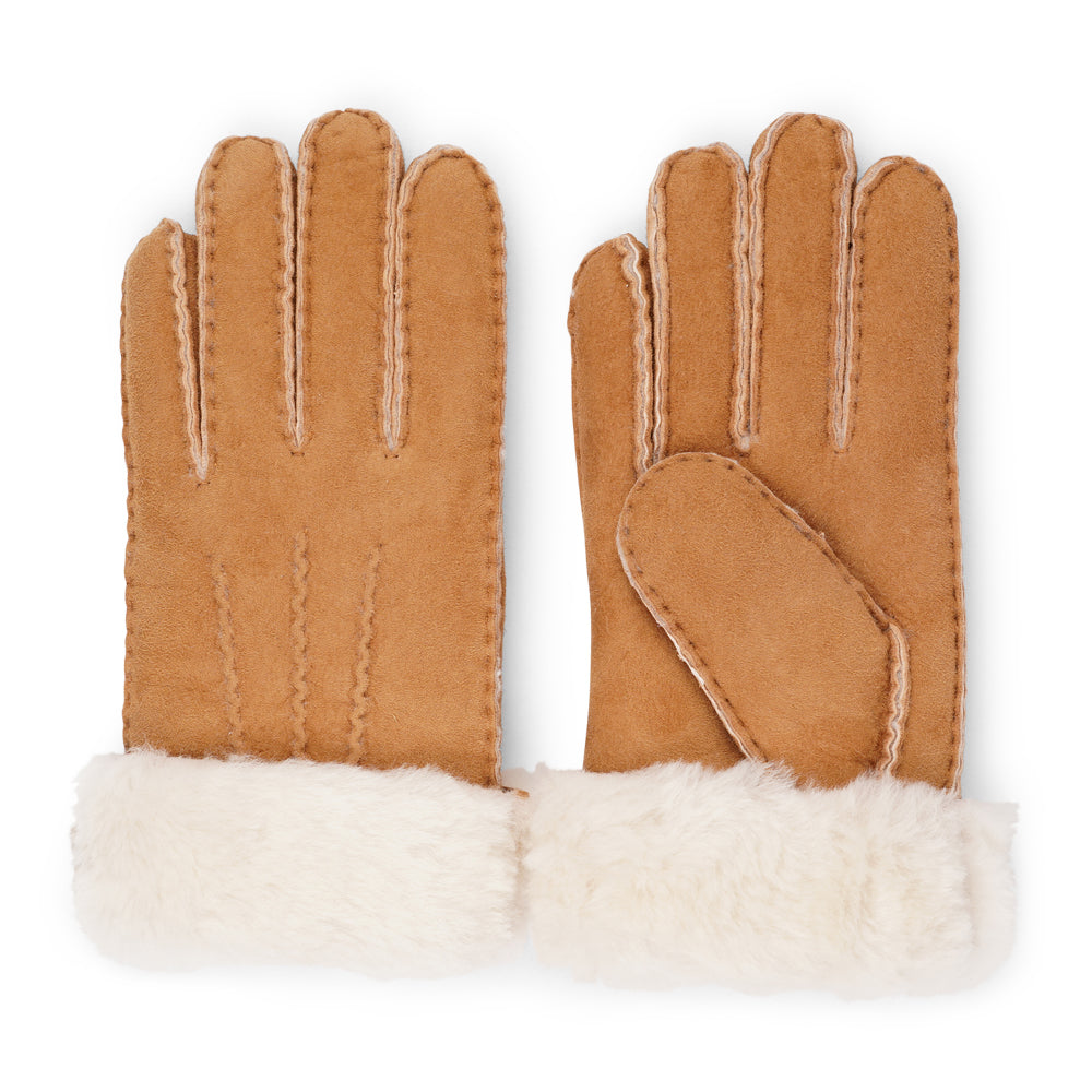 Elevate your winter wardrobe with our luxurious Kelly Shearling Gloves. Crafted from supple sheep leather, these gloves are designed to provide you with both style and warmth during the colder months.
These gloves are uniquely long and slim, providing a sleek and feminine silhouette that not only keeps you warm but also adds a chic touch to any outfit.